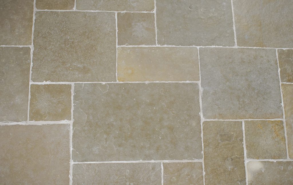 Cathedral limestone opus pattern flooring layout showing mixed stone sizes in classic French pattern design