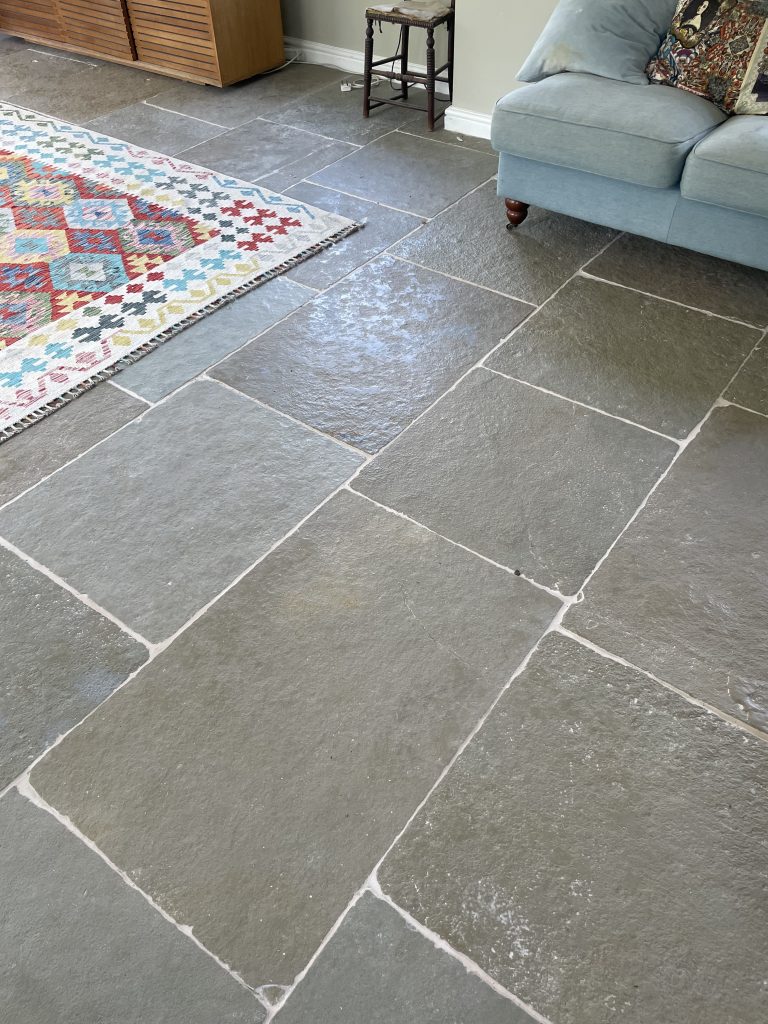 Natural limestone cathedral stone floor in traditional Dorset home