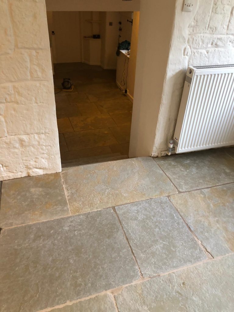 Cathedral limestone kitchen floor installation in Dorset