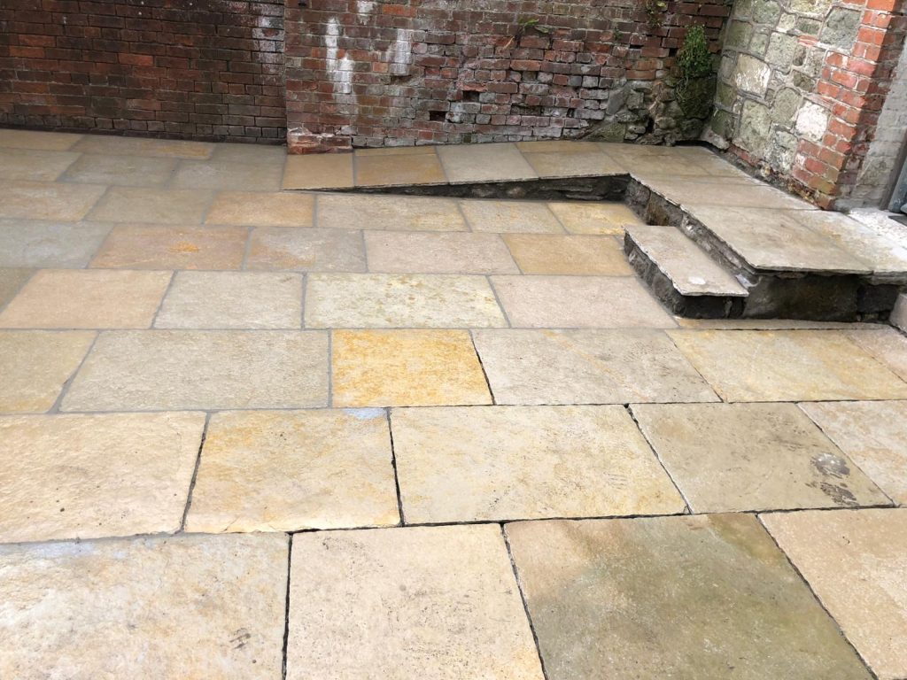Cathedral limestone kitchen floor installation in Dorset