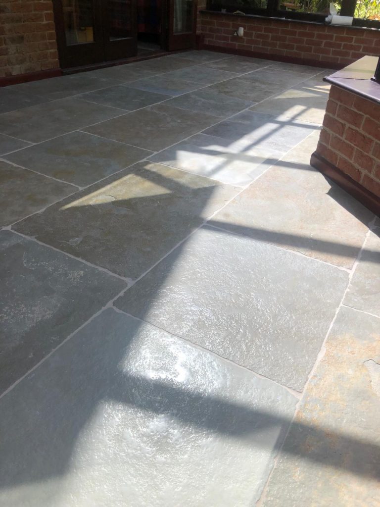 Cathedral limestone kitchen floor installation in Dorset