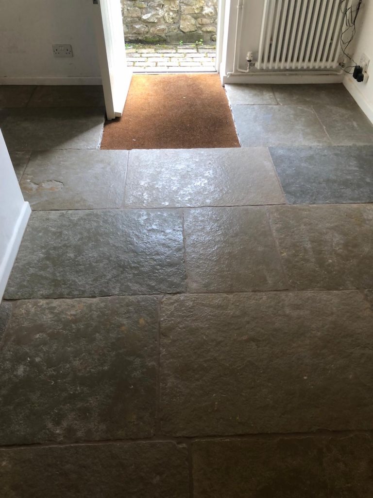 Cathedral limestone hallway flagstone flooring with recessed matwell