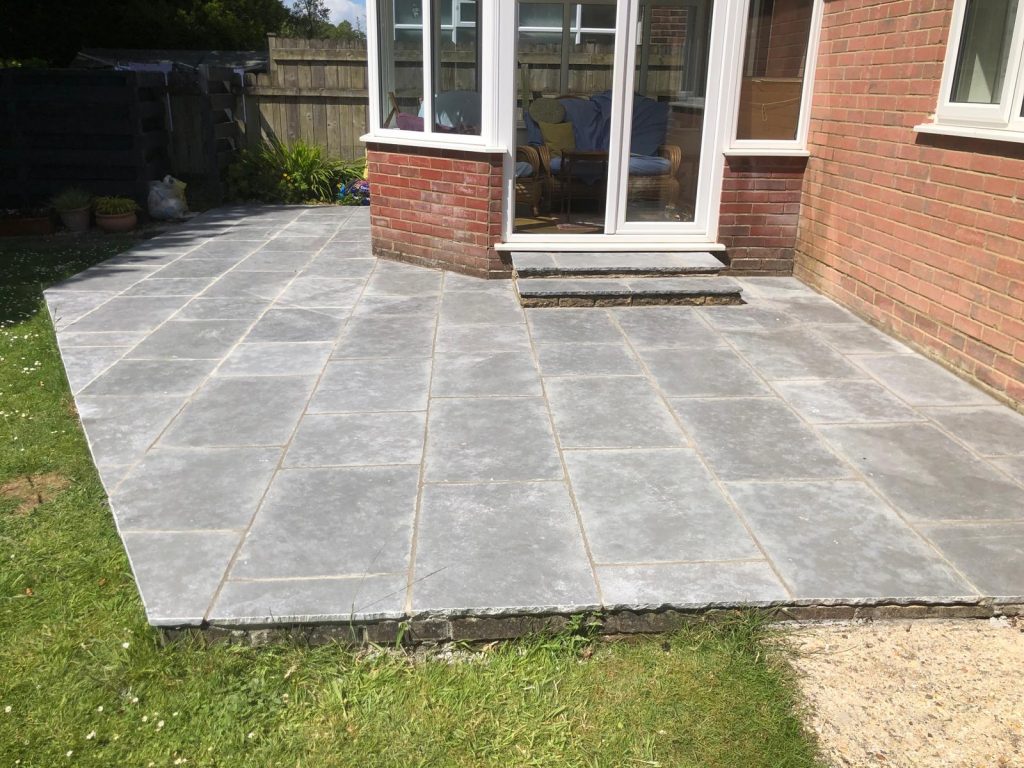 Southwell Limestone outdoor patio with random lengths and a step.