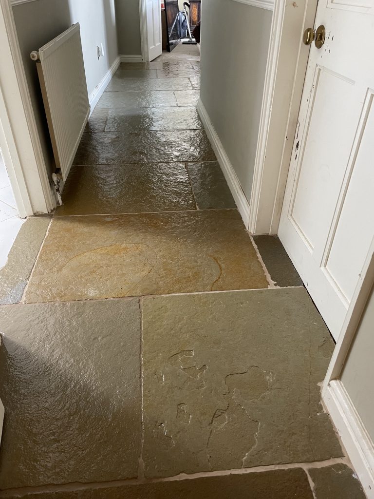 Cathedral Limestone hallway flooring with twin doorways and clean, freshly finished surface in Bruton