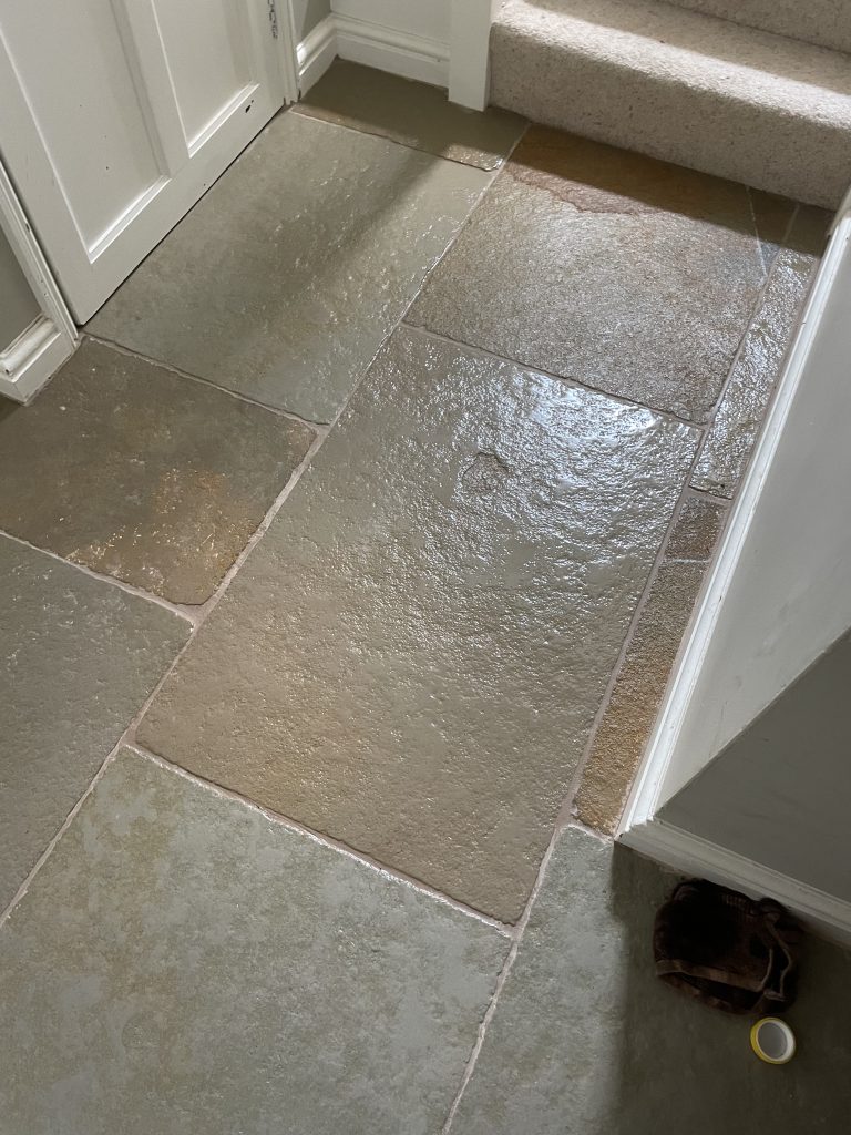 Close-up of Cathedral Limestone flooring detail in doorway threshold area