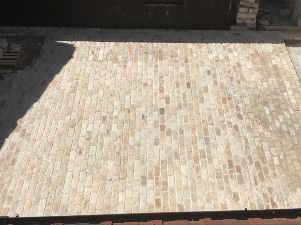 Cathedral limestone pavers installed in a Dorset courtyard.
