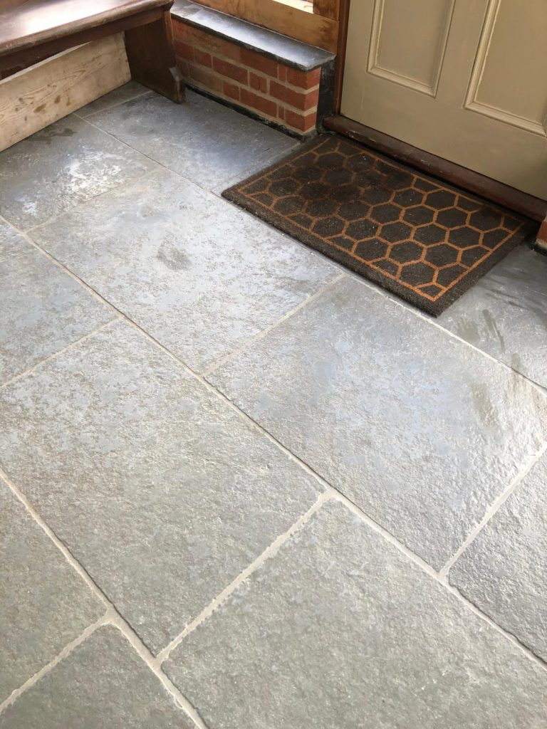 Grey cathedral Flagstones layed in a porch in Dorset.