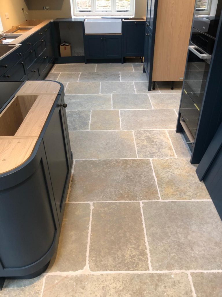 Stone Flooring Gillingham Dorset showing Hampton Olive stone in a Dorset kitchen.