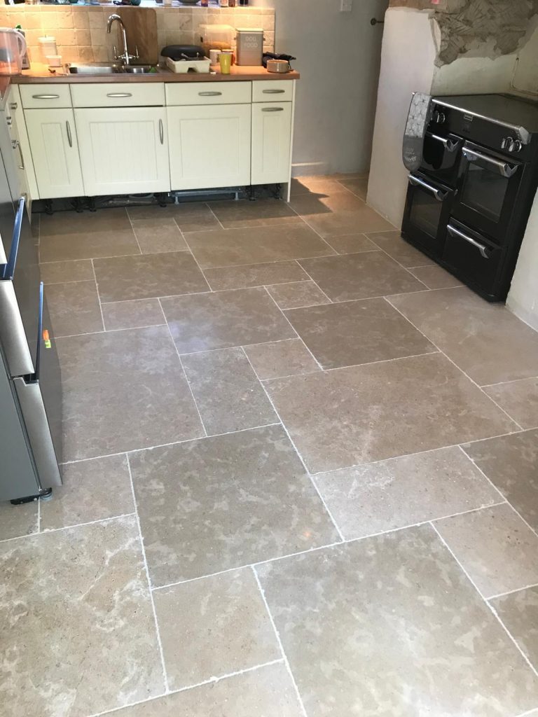 Stone flooring Birmingham showing Heritage limestone in an opus pattern