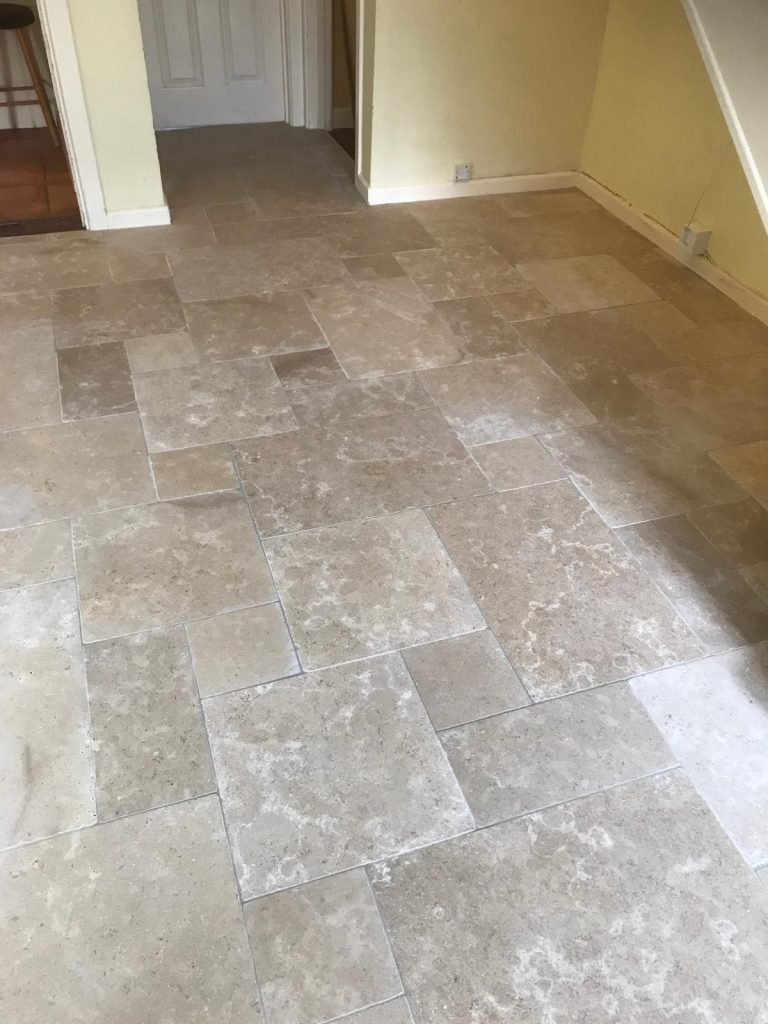 Stone flooring Gloucestershire showing Heritage limestone floor in an opus pattern.