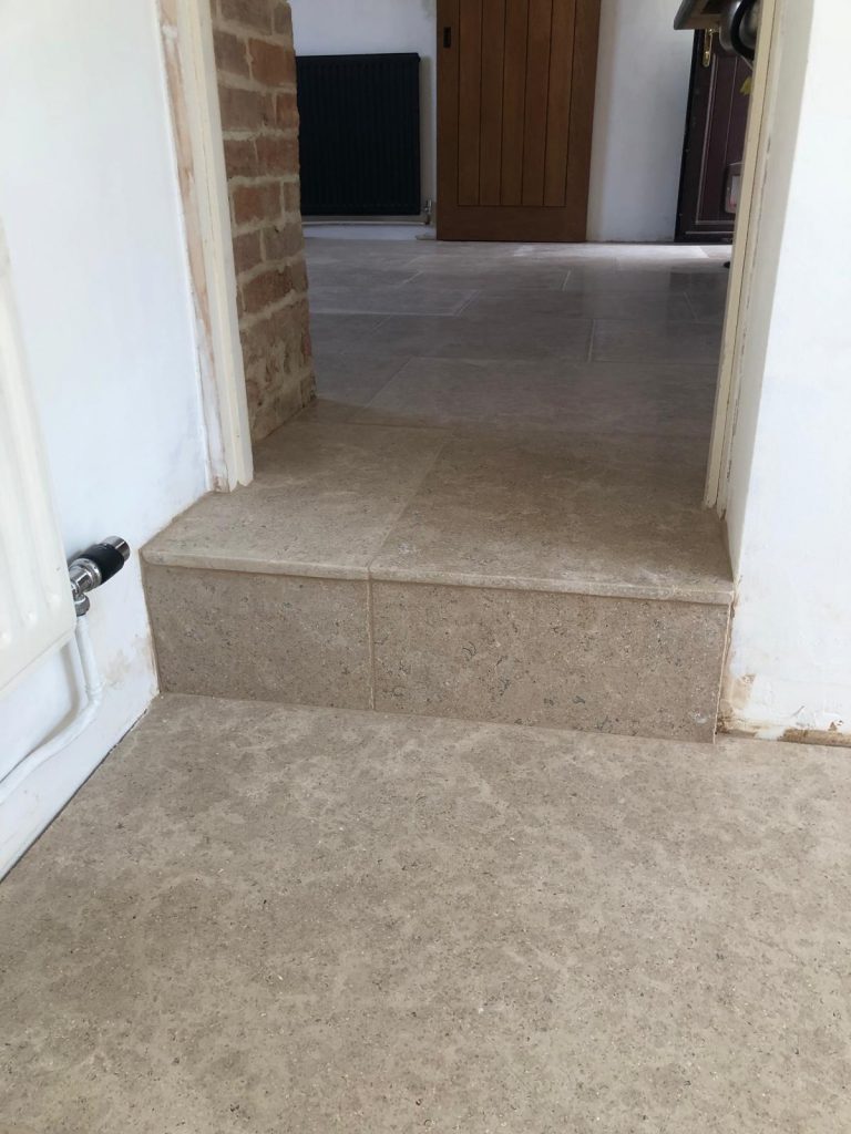 Heritage limestone flagstone flooring with step detail and soft tumbled edges