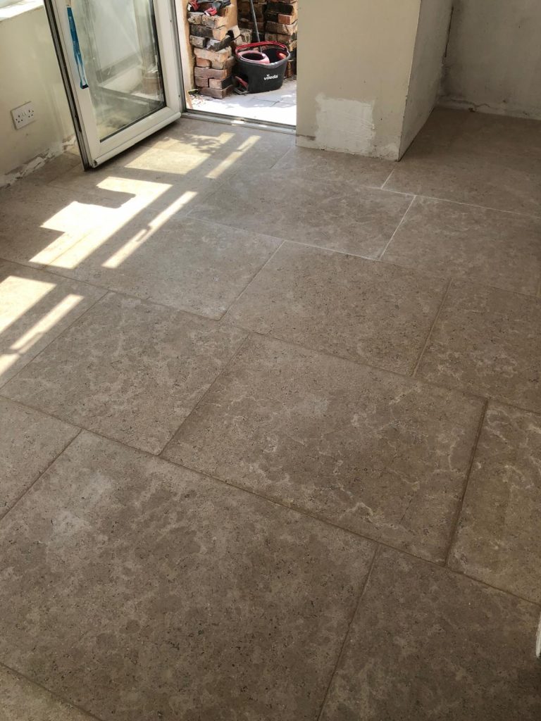 Heritage limestone random length flagstone flooring installed in kitchen
