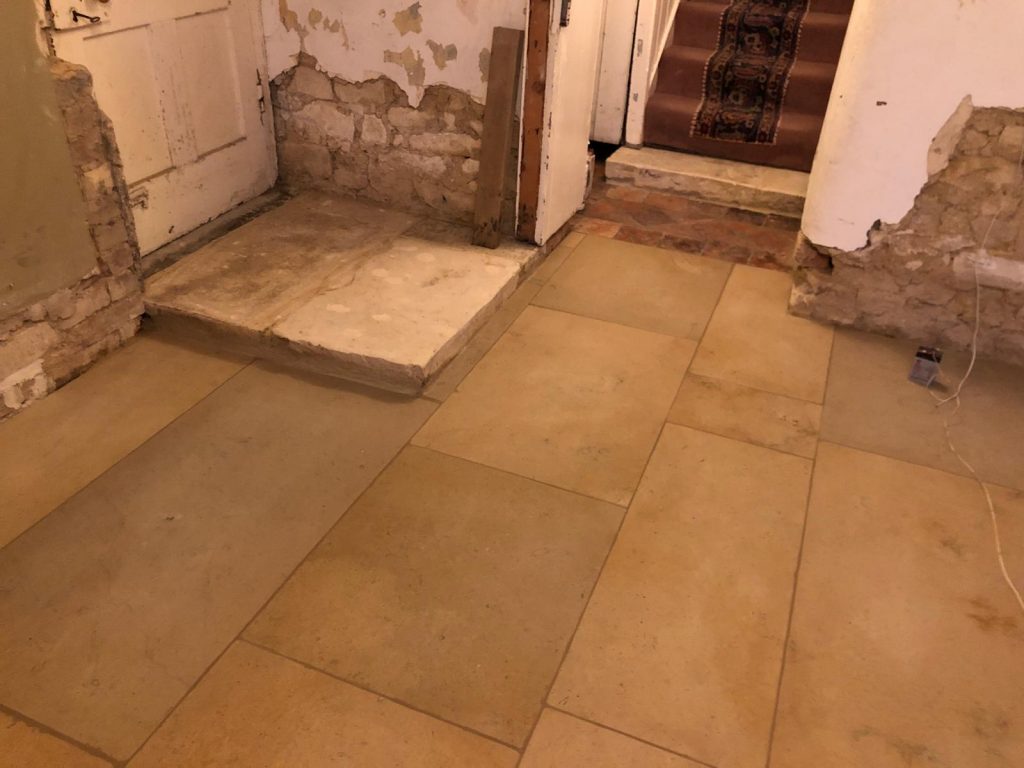 Marnhull flagstone flooring showing varying widths and lengths.