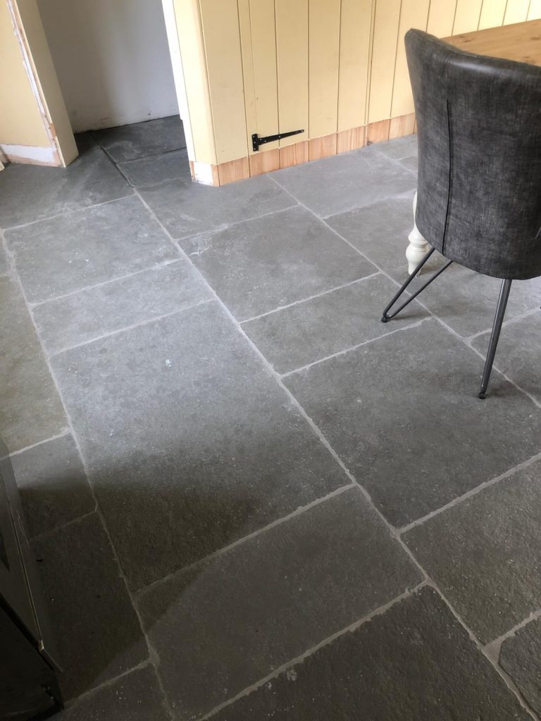 Close-up of Southwell limestone floor highlighting brushed and honed surface with subtle natural texture.