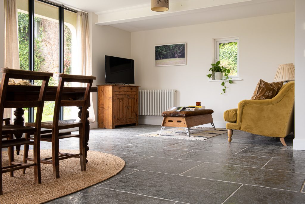 Southwell limestone flooring laid in random lengths, suitable for traditional and period-style interiors.