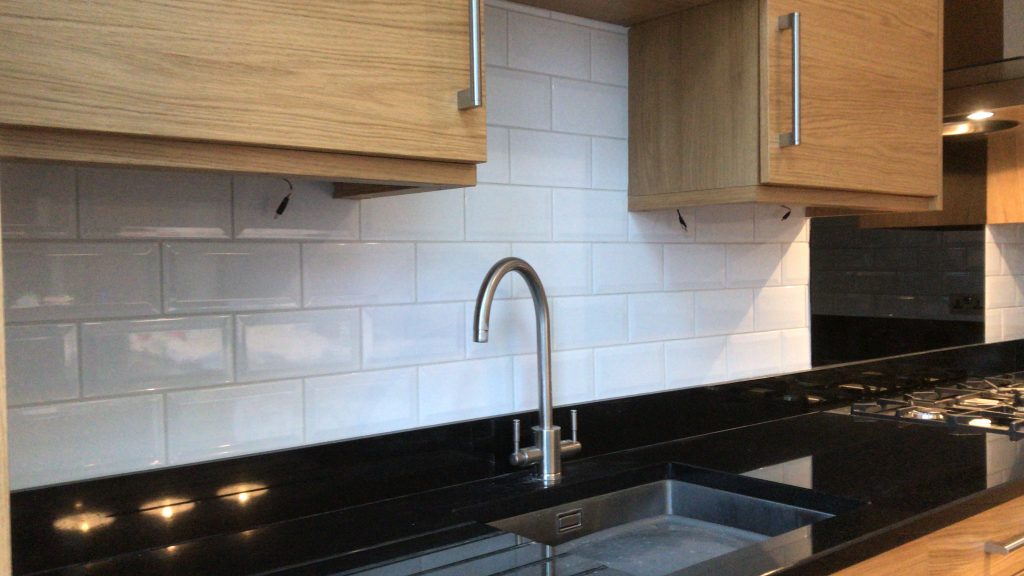 decorative bevel edged tiles installed in a kitchen by simali stone
