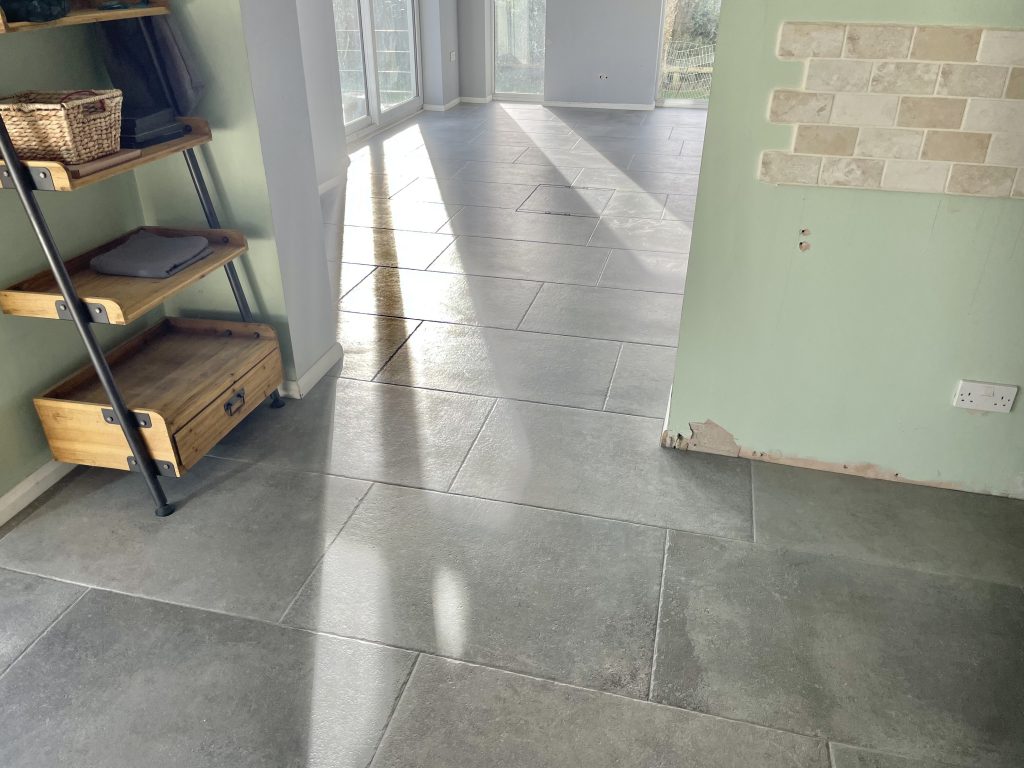 stone flooring Bristol showing a porcelain large format tile floor across two rooms
