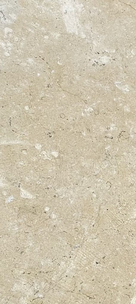 Cut Marnhull stone slabs showing natural shell content and internal limestone structure