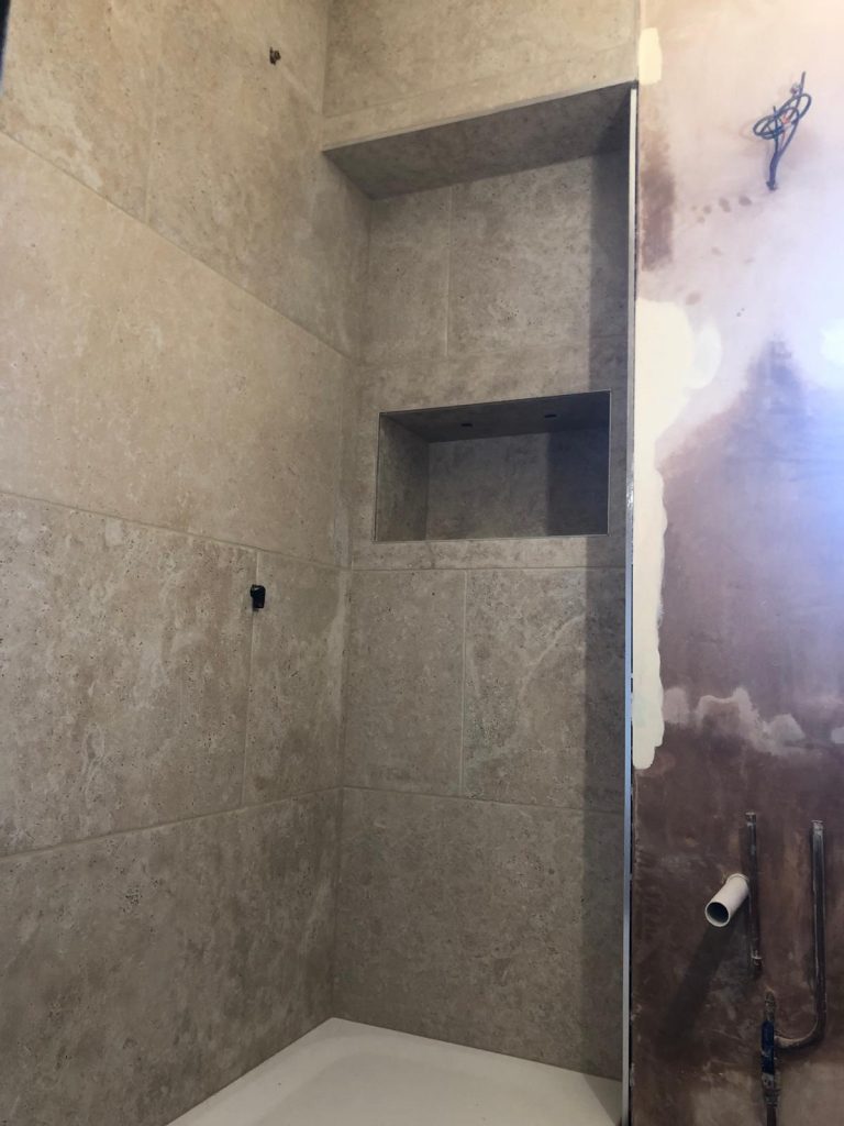 Shower walls tiled with large format porcelain in Shaftesbury