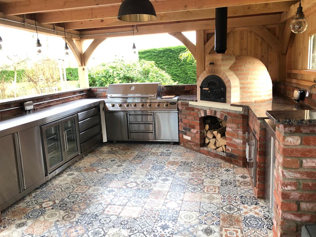 Decorative 200x200 porcelain floor tiles installed on an outdoor patio in Dorset