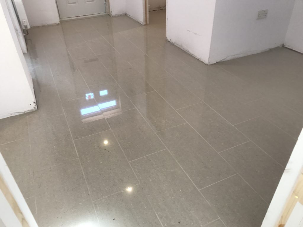 porcelain kitchen floor tiling showing 600x300 glossy tiles