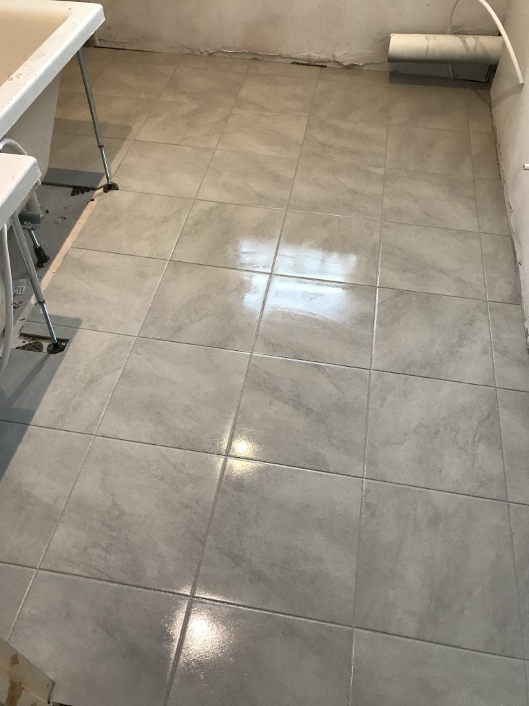 grey stone effect porcelain bathroom floor tiles 300x300 installation