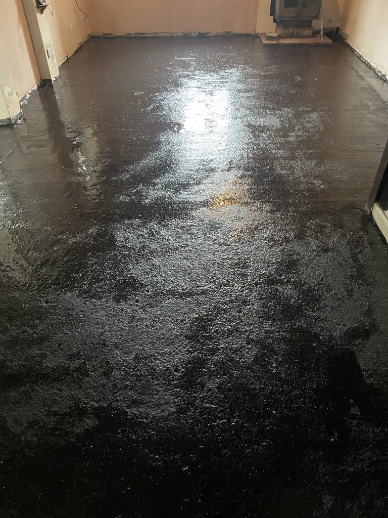 Stone flooring wincanton customers can see the damp proof membrane applied to the screed before tiling