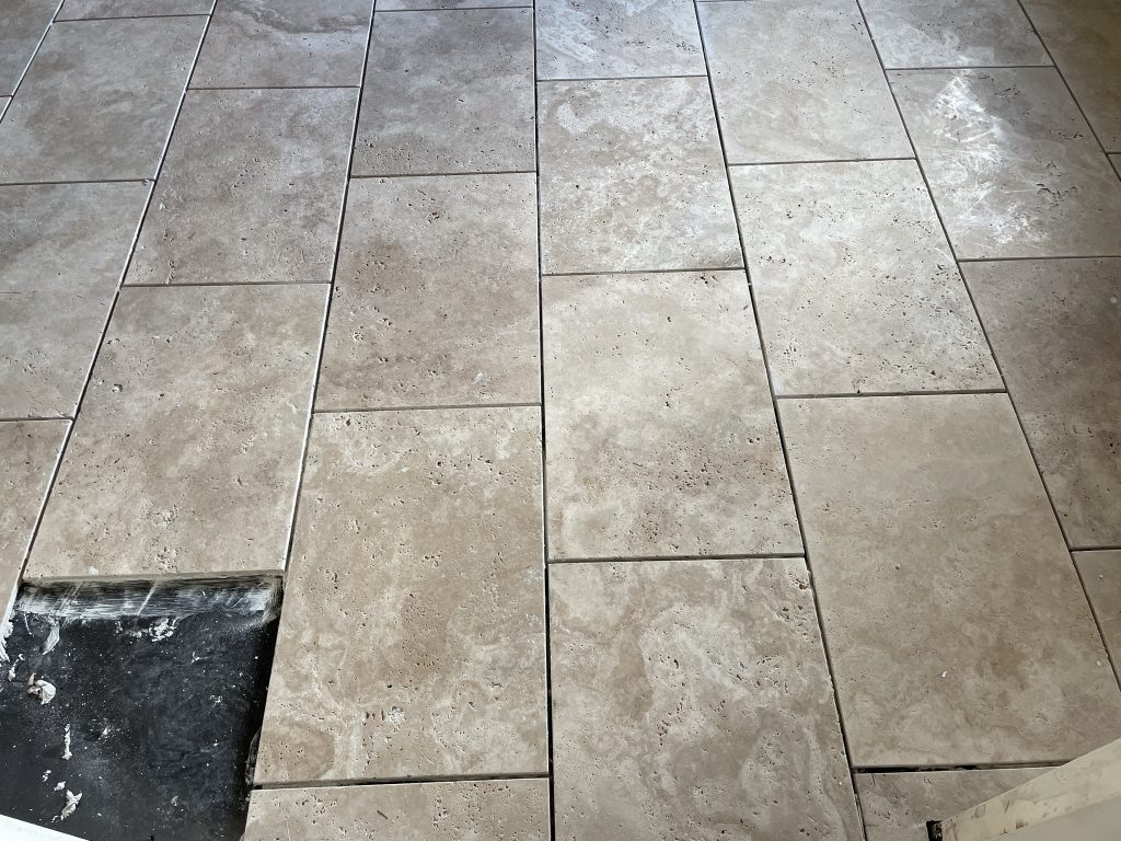 travertine suppliers Dorset large format tiles showing installation progress