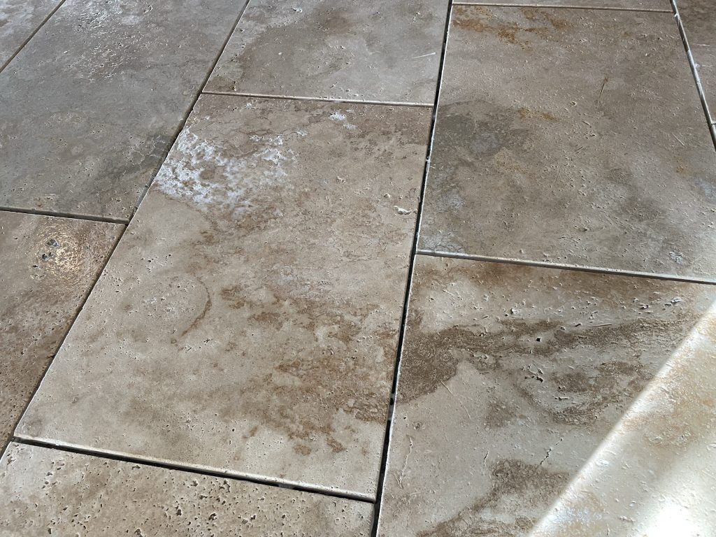 close up of travertine tiles sealed