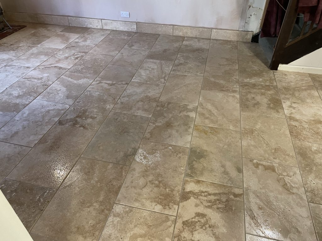 Living room floor tiled with upstands, sealed and grouted