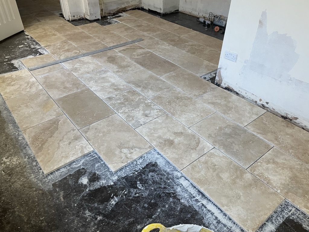 Travertine 600x400 tumbled,unfilled tiles partly installed