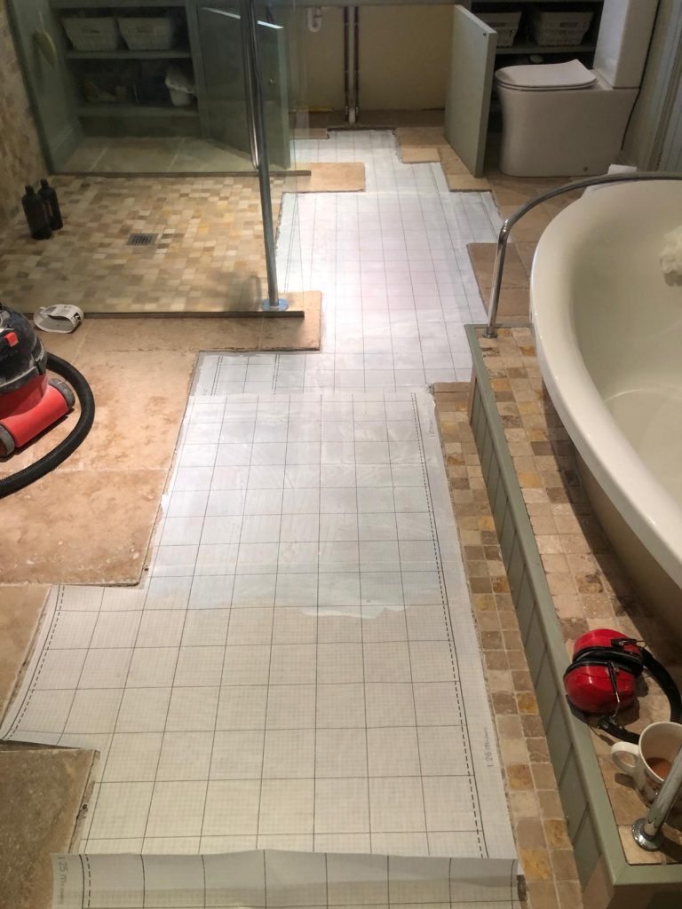 Anti fracture mat installed to the timber overboards.  This allows movement to be absorbed and the tiles to stay in one piece.