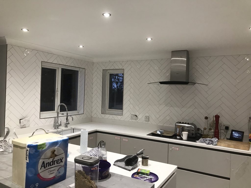 View of kitchen wall tiles in herringbone style white 300x75 size
