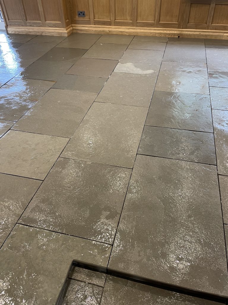 Ludlow Limestone showing an ungrouted floor still wet from sealer with a nice stone step feature in Wiltshire.