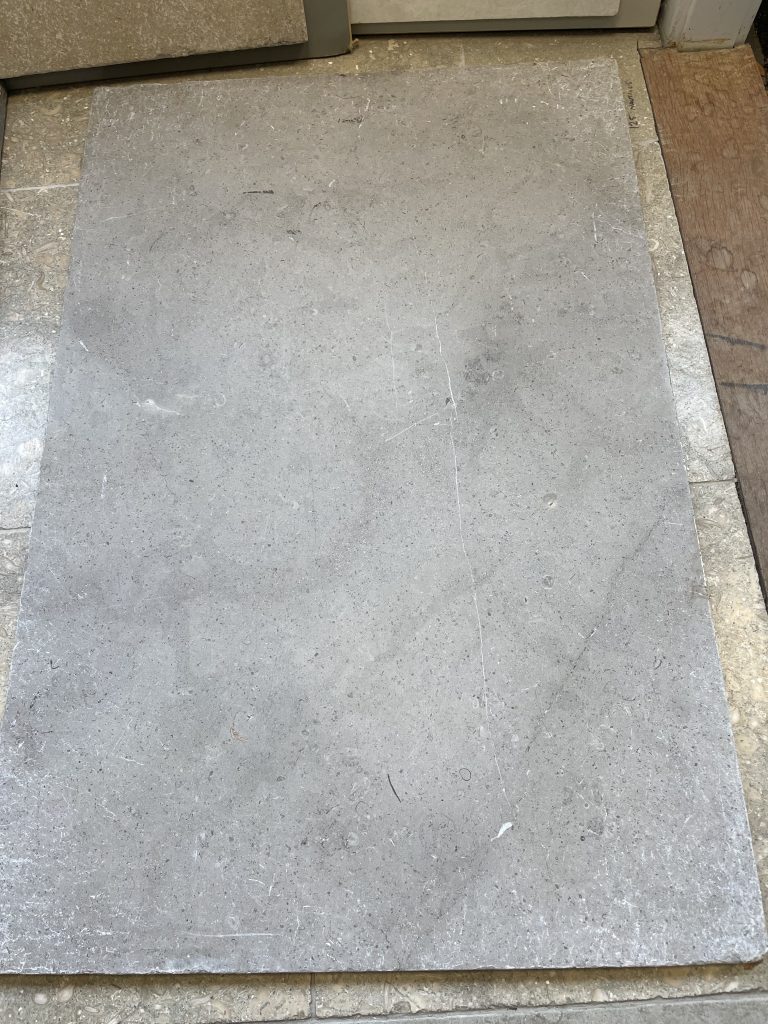 Kelso limestone available at simali stone. A pale grey limestone with calcite lines and fossils subtley sprinkled through out the stone
